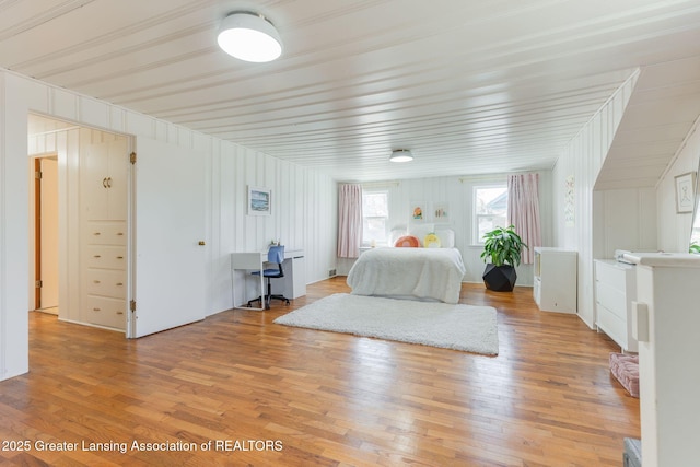 unfurnished bedroom with light wood-type flooring