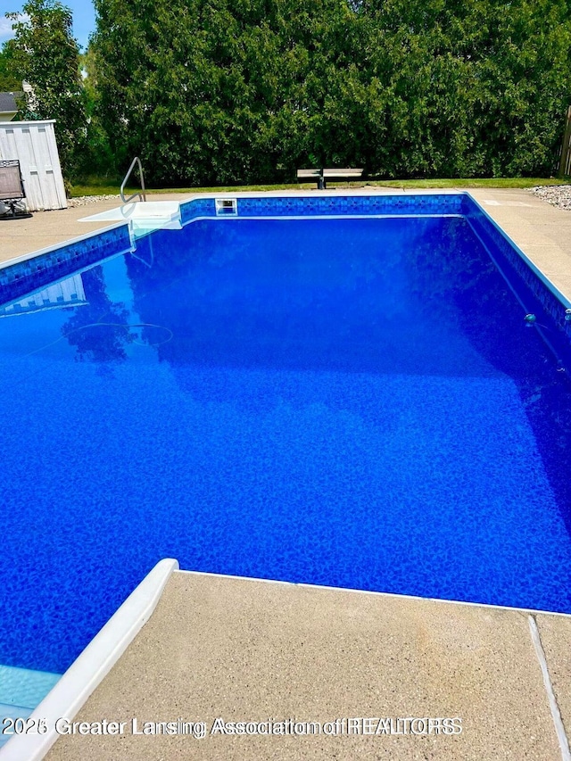 pool featuring a patio