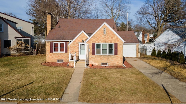 view of front of house with brick siding, a shingled roof, a front lawn, a chimney, and driveway