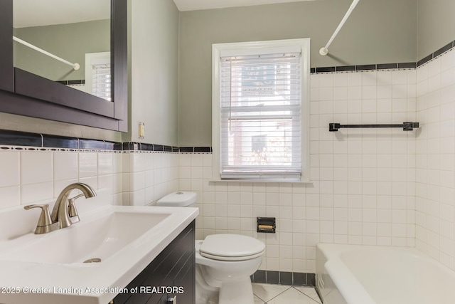 bathroom featuring shower / bathing tub combination, toilet, a healthy amount of sunlight, and tile patterned flooring