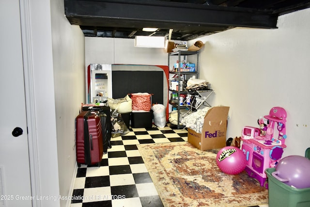 finished basement with tile patterned floors