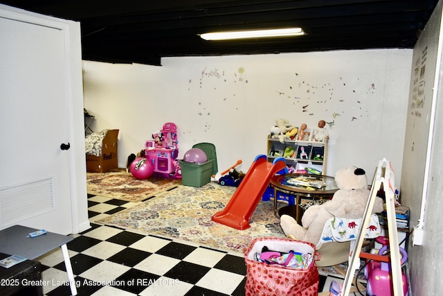 game room featuring tile patterned floors