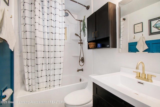 full bath with shower / bathtub combination with curtain, toilet, and vanity