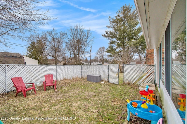 view of yard with a fenced backyard