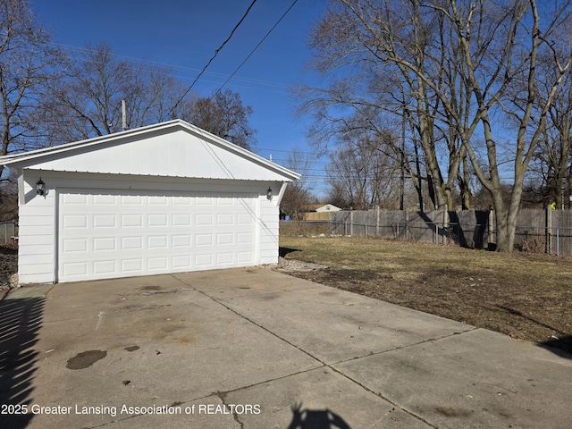 detached garage with fence