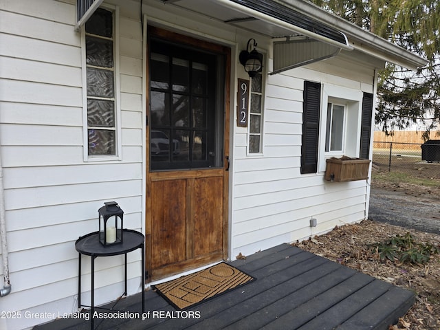 property entrance with fence