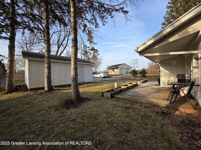 view of yard with a wooden deck