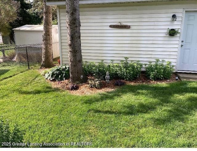 view of yard featuring fence