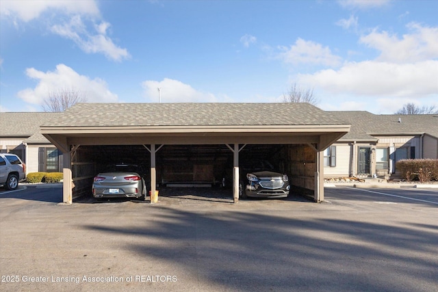 view of partially covered parking lot