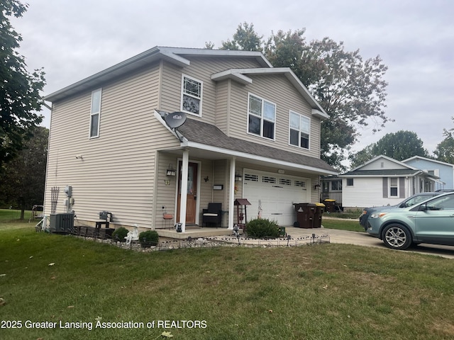 traditional-style home with a front lawn, central AC, roof with shingles, concrete driveway, and an attached garage