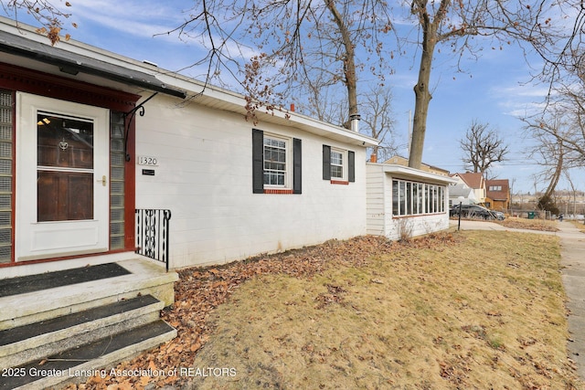 exterior space featuring concrete block siding