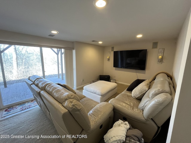 living room with recessed lighting, visible vents, carpet floors, and baseboards