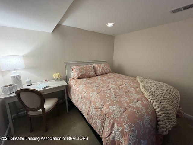 carpeted bedroom with visible vents