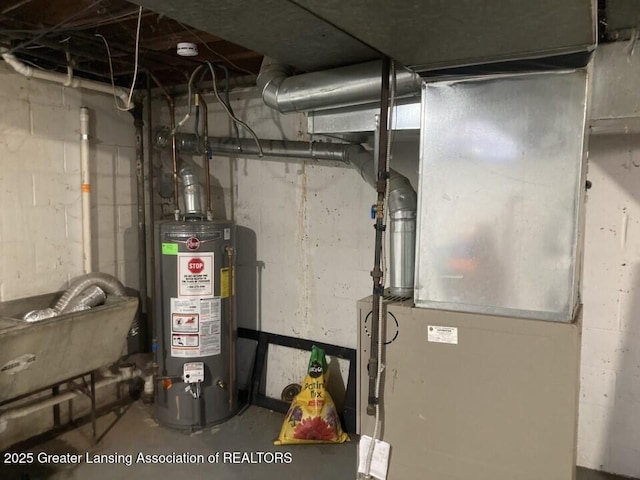 utility room with gas water heater