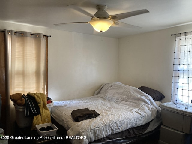 bedroom featuring ceiling fan