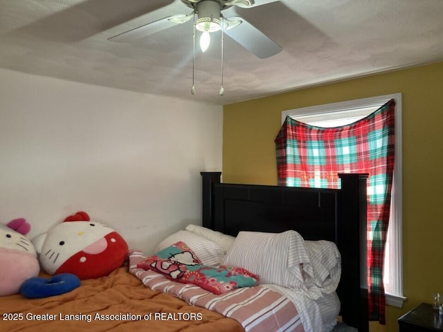 bedroom featuring a ceiling fan