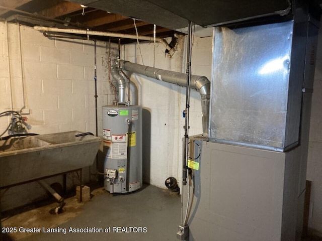 utility room featuring gas water heater