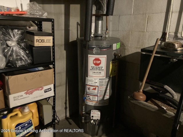 utility room with water heater