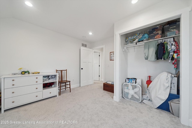 interior space featuring visible vents, recessed lighting, a closet, carpet, and baseboards