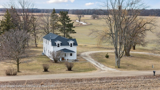 birds eye view of property featuring a rural view