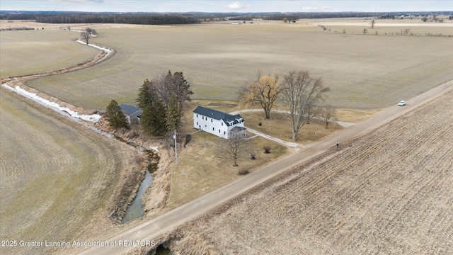 birds eye view of property featuring a rural view