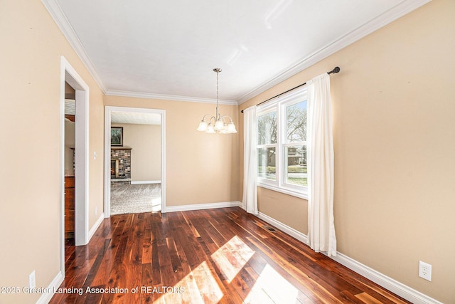 unfurnished dining area with dark wood finished floors, baseboards, and a chandelier