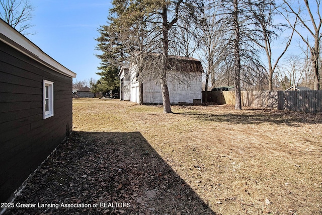 view of yard with fence