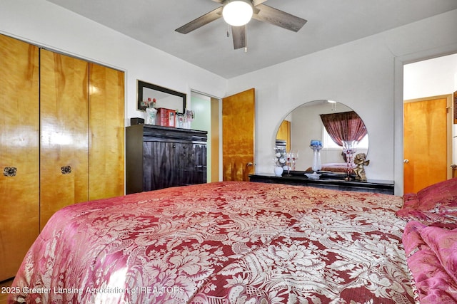 bedroom with a closet and a ceiling fan