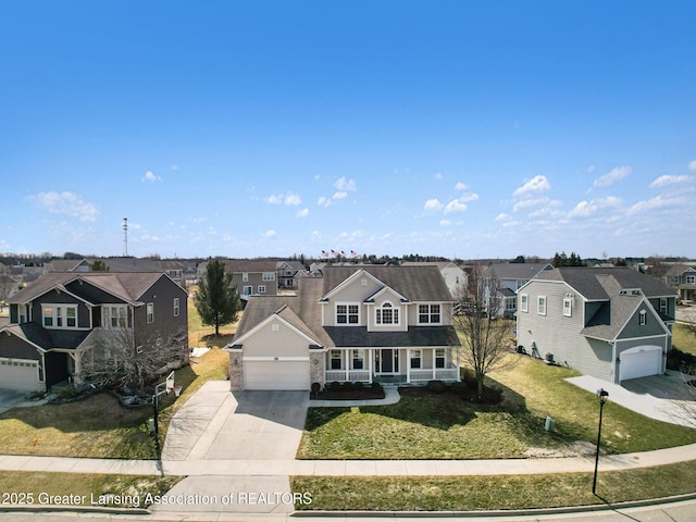 drone / aerial view with a residential view