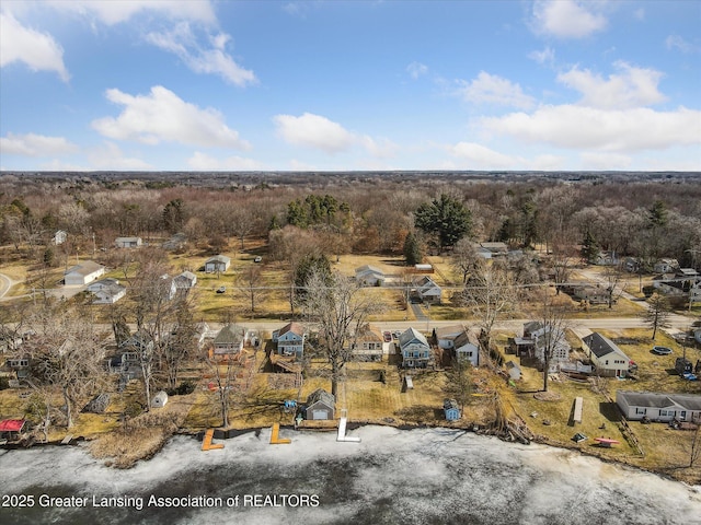 birds eye view of property with a residential view