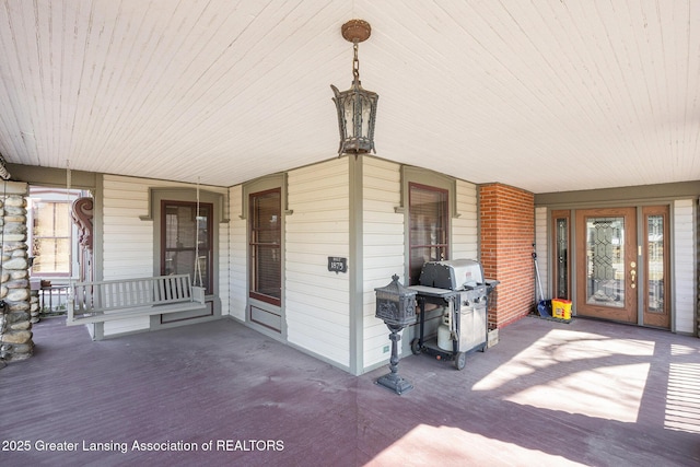 view of patio / terrace featuring a porch and area for grilling
