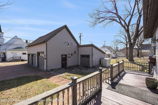 exterior space with a garage and driveway