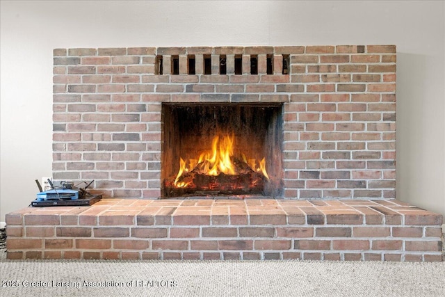 interior details with a fireplace