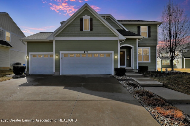view of front of property featuring driveway