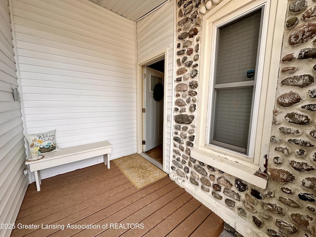 1793 N Shore Dr, Crystal, MI 48818 - doorway to property with stone siding