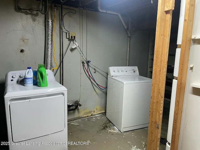 laundry room with washing machine and dryer and laundry area