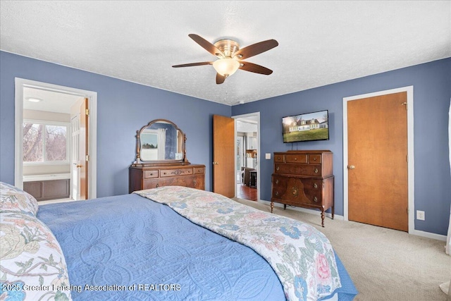 13305 Nelson, Bath, MI 48808 - bedroom featuring baseboards, a ceiling fan, a textured ceiling, carpet floors, and connected bathroom