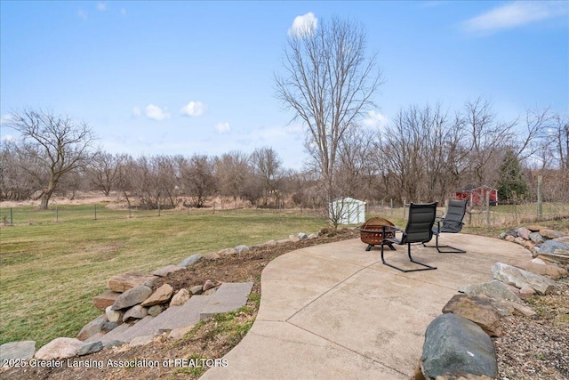 13305 Nelson, Bath, MI 48808 - view of patio with a fire pit