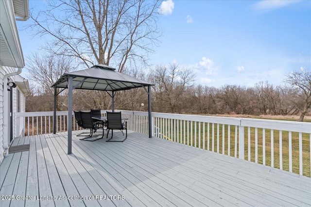13305 Nelson, Bath, MI 48808 - wooden terrace with a gazebo, a yard, and outdoor dining space