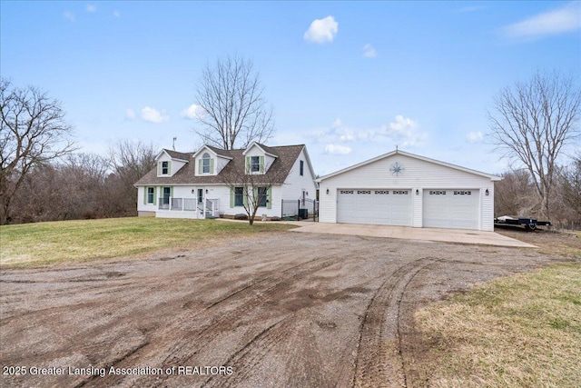 13305 Nelson, Bath, MI 48808 - cape cod-style house with a front yard, a porch, an outdoor structure, and a detached garage