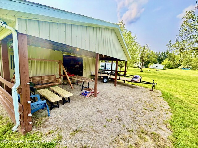 8464 W Howe Rd, Eagle, MI 48822 - exterior space with an outbuilding and a lawn