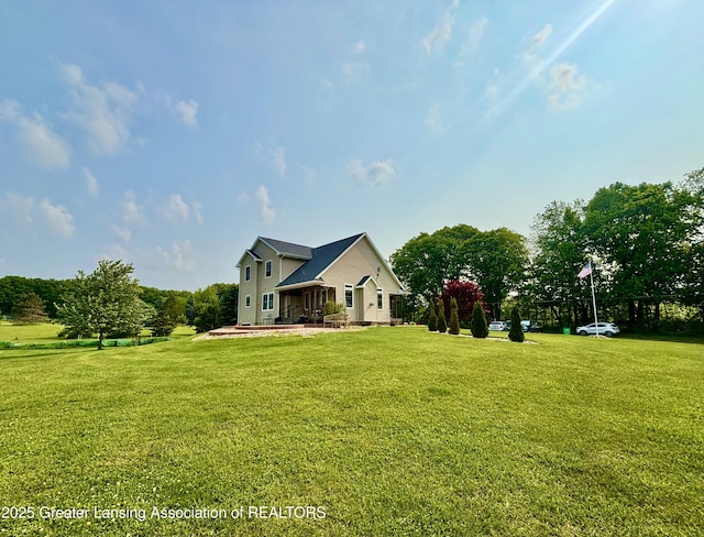 8464 W Howe Rd, Eagle, MI 48822 - view of front of house featuring a front lawn