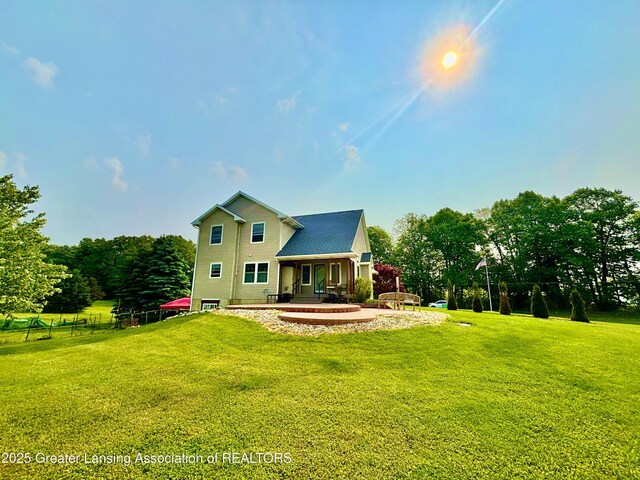8464 W Howe Rd, Eagle, MI 48822 - view of rear view of property