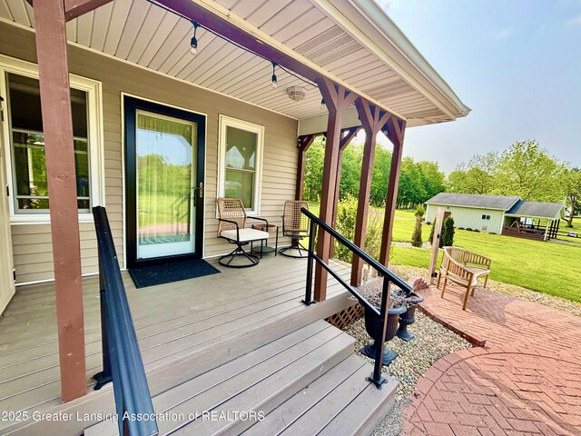 8464 W Howe Rd, Eagle, MI 48822 - porch with a lawn
