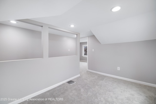 bonus room with baseboards, vaulted ceiling, recessed lighting, and carpet