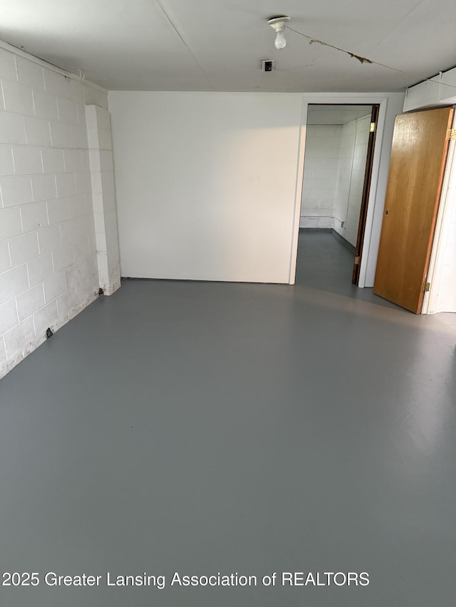 831 Jackson St, Eaton Rapids, MI 48827 - finished below grade area featuring concrete block wall