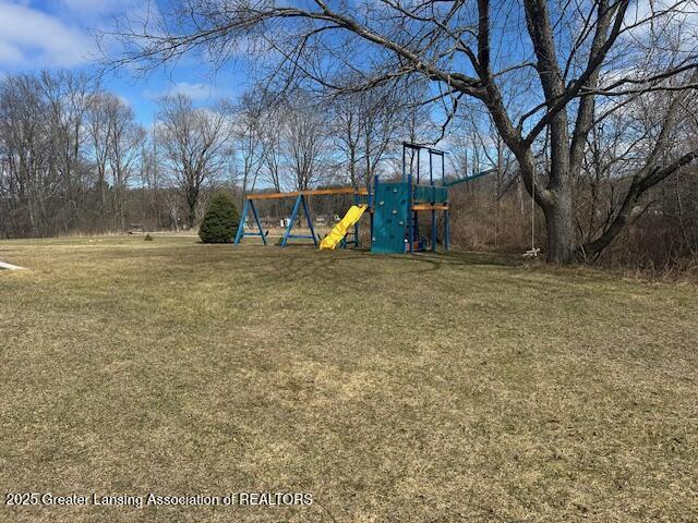464 N Rolland Rd, Weidman, MI 48893 - view of yard with playground community