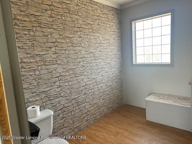 464 N Rolland Rd, Weidman, MI 48893 - bathroom with ornamental molding, wood finished floors, and toilet