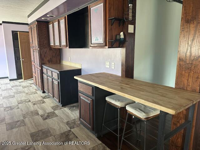 464 N Rolland Rd, Weidman, MI 48893 - kitchen featuring open shelves