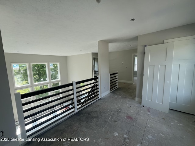 11350 Traverse Dr, Grand Ledge, MI 48837 - hall with an upstairs landing and baseboards